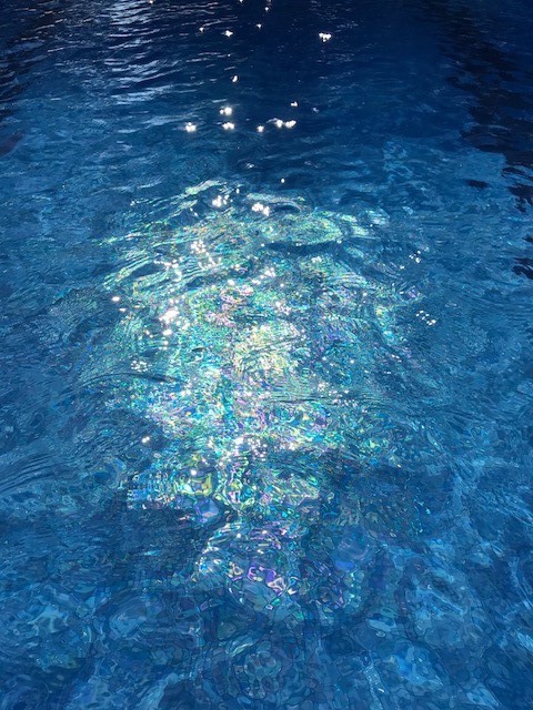 iridescent light pool water blue design
